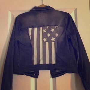 Black jean jacket w/ American flag.